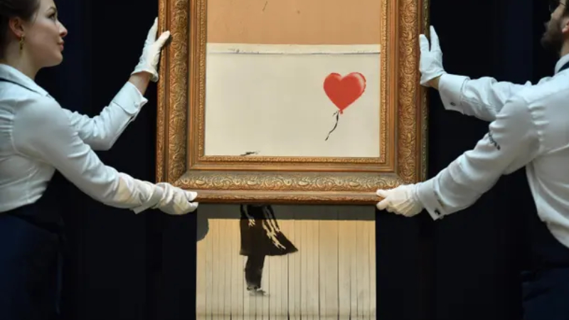 Banksy'nin kendini parçalayan yapıtı 'Kırmızı Balonlu Kız', tekrar açık artırmaya çıkarılacak