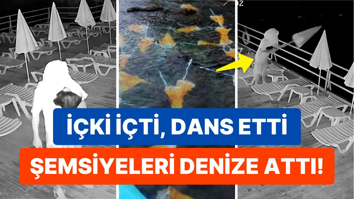 Havluyla Yüzünü Kapatıp Dans Gösterisi Yapan Bir Kişi Plaj Şemsiyelerini Denize Fırlattı